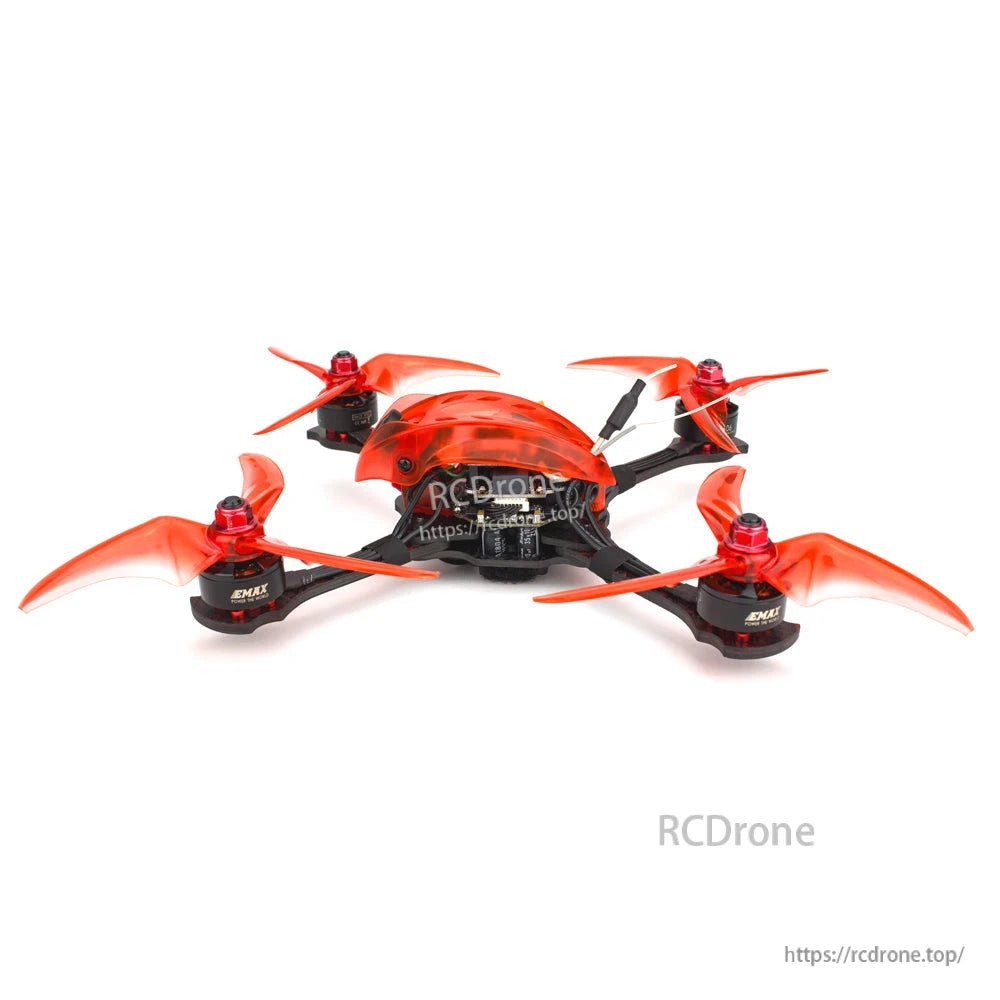 Low rear three-quarter view highlighting orange canopy profile, motor layout, and propeller spacing on frame
