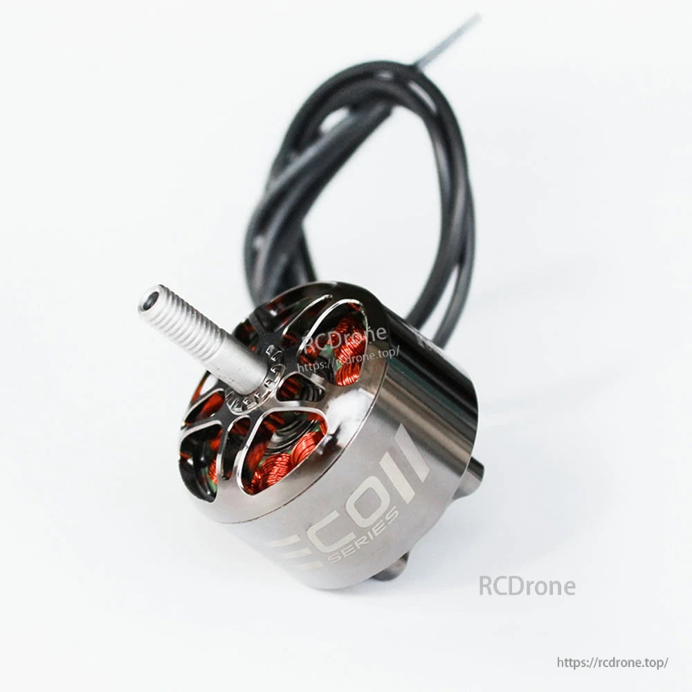 Diagonal top view of ECOII Series motor showing shaft, vented bell and long leads