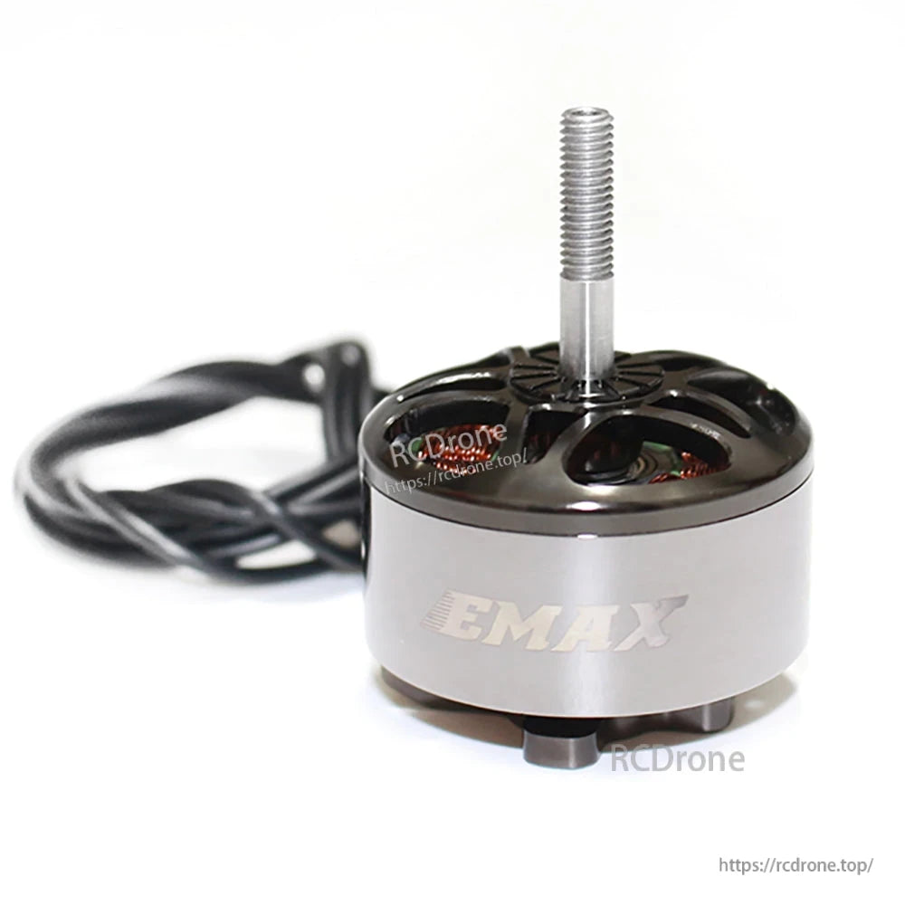 Front view of EMAX motor can with logo, threaded shaft centered and wiring trailing behind