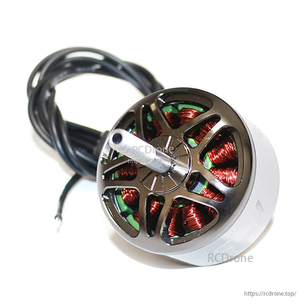 Top-down view of vented motor bell showing copper windings and threaded shaft detail