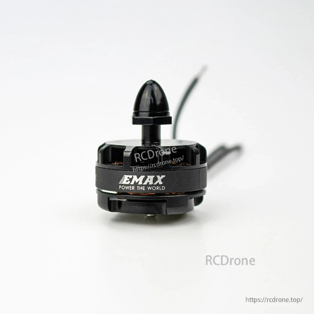 Front view of EMAX logo on motor can with installed prop nut cap, wires trailing behind