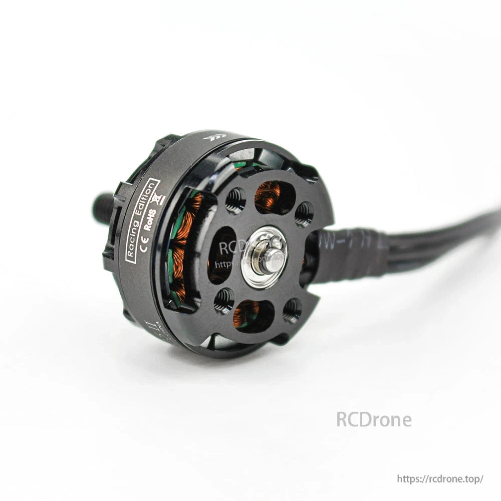 Rear mounting plate close-up showing bolt holes, center hub, and wire lead connection