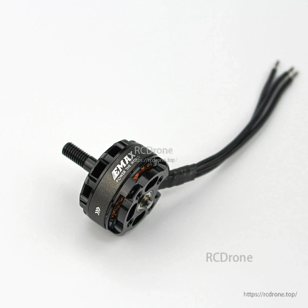 Angled view of EMAX MT2205II motor showing side vents, copper windings, and attached wires