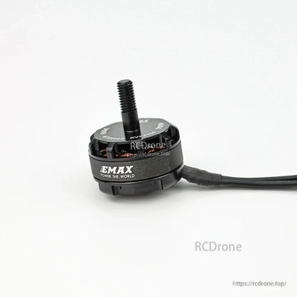 Side angle showing EMAX logo on motor can, threaded shaft, and wire exit point