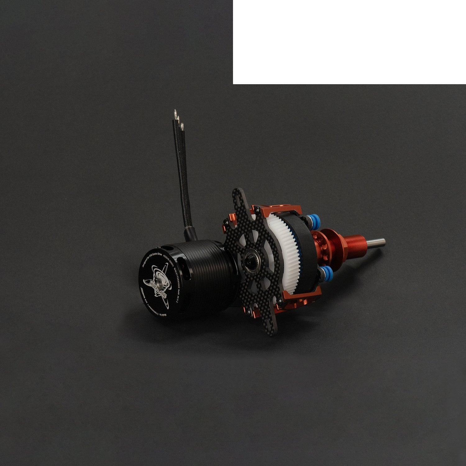 Contra drive motor and gearbox assembly lying on side, carbon plate and white gear visible