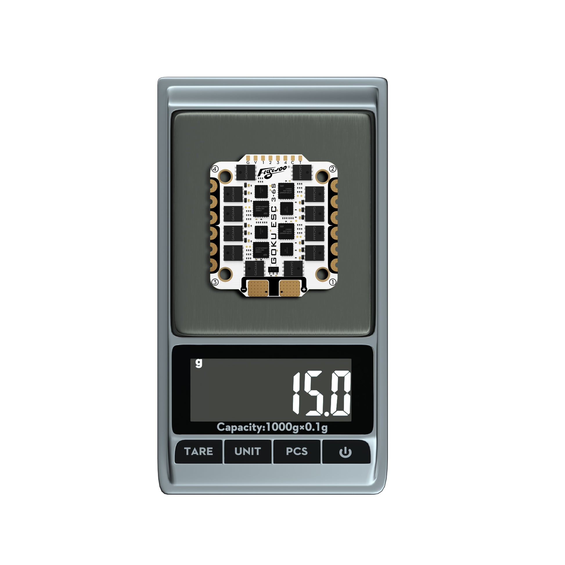 Flywoo GOKU G55M ESC board on digital scale reading 15.0g, with four mounting holes and edge solder pads
