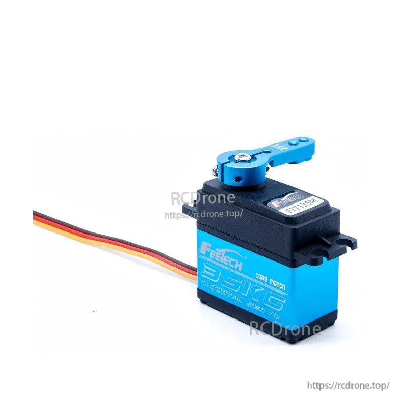 FT7135 servo with blue aluminum servo arm installed on output shaft, showing mounting tabs and label