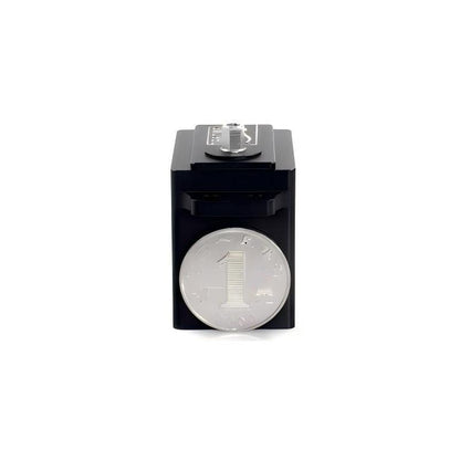 FEETECH SM2924MB servo motor front view with output shaft, shown with coin for size reference