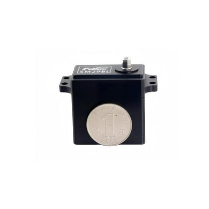 SM2924MB servo side view showing mounting tabs and top label with metal output shaft