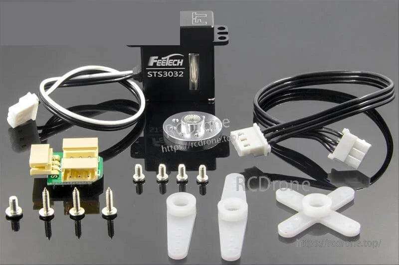 Package contents: STS3032 servo, horns, screws, wires, and small adapter board