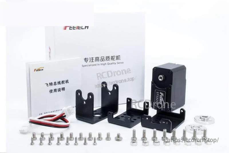 Servo kit package contents with brackets, horn, screws, cable, and manuals alongside the servo