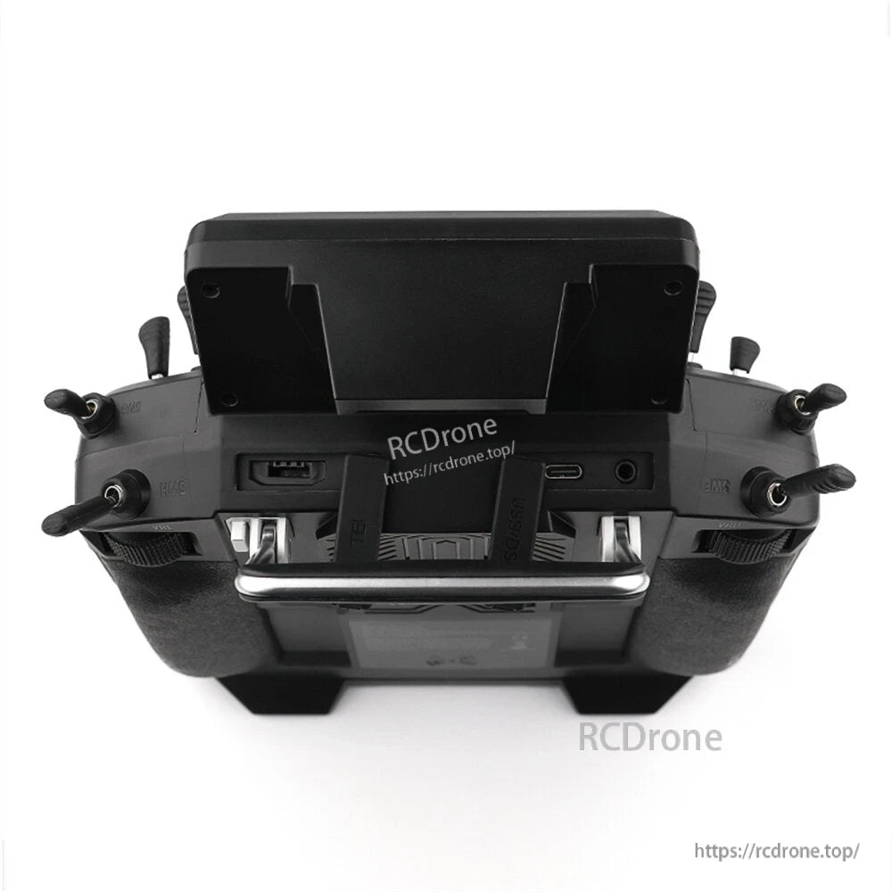 Top edge close-up showing ports and switches beneath the screen mount