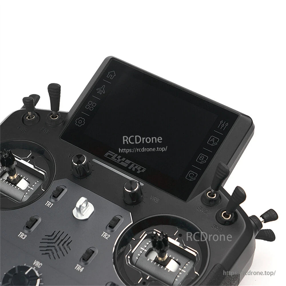Close-up of the touchscreen display and upper controls on the transmitter face
