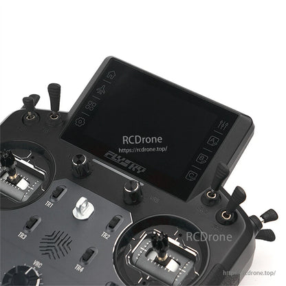 Close-up of the touchscreen display and upper controls on the transmitter face