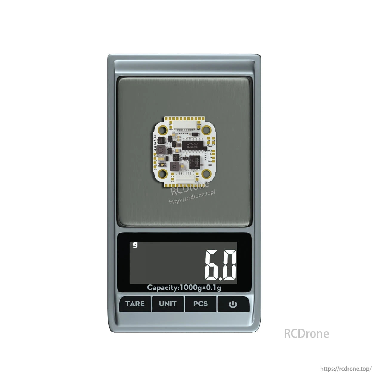 FLYWOO GOKU F722 Pro Mini V2 flight controller on a digital scale showing 6.0 g weight