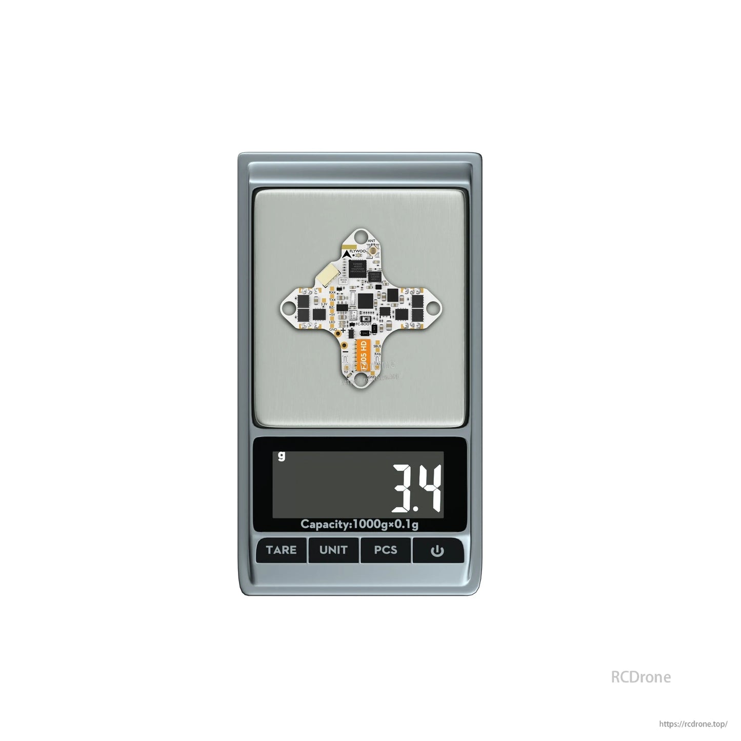FLYWOO GOKU F405 HD 1S AIO FC/ESC board on a digital scale showing 3.4 g weight