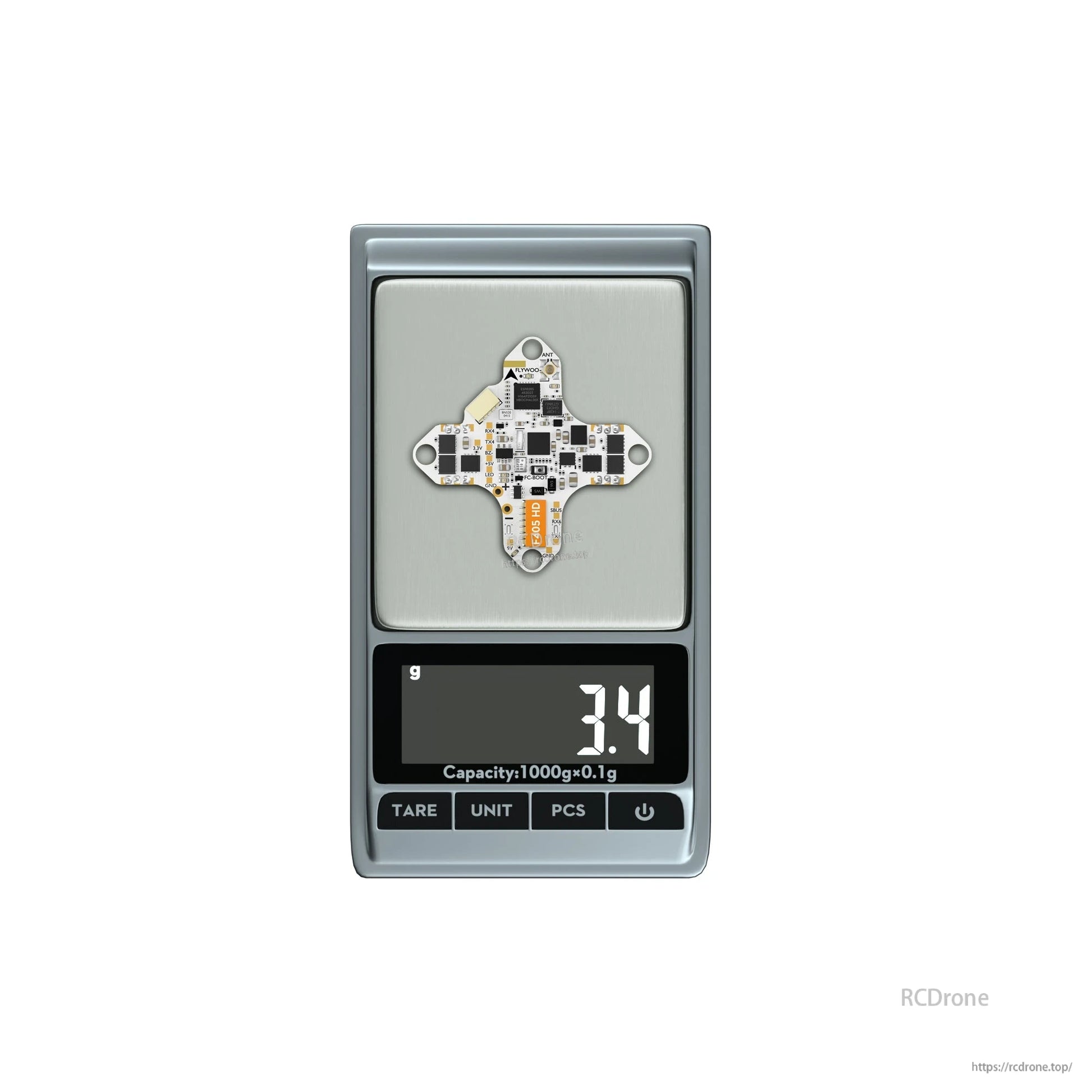 FLYWOO GOKU F405 HD 1S AIO FC/ESC board on a digital scale showing 3.4 g weight