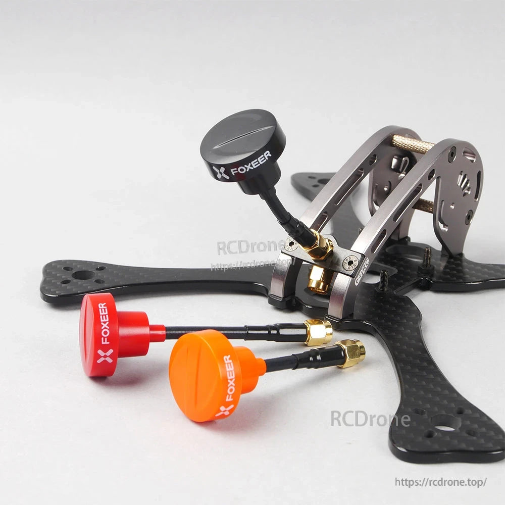 FOXEER Pagoda PRO 5.8G RHCP Omni FPV Antenna, FOXEER Pagoda Pro 5.8GHz FPV omni antenna with short coax lead and gold SMA connector, shown in red, orange and black