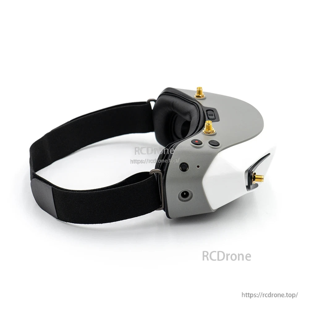 Right-side view of FPV goggles showing control buttons and side ports near the faceplate