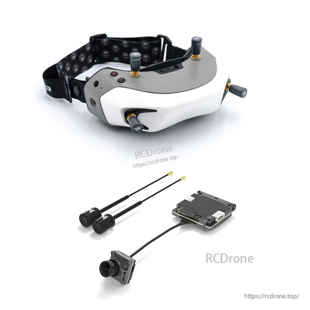 Goggles with accessories: two whip antennas, finned transmitter module and FPV camera on cable