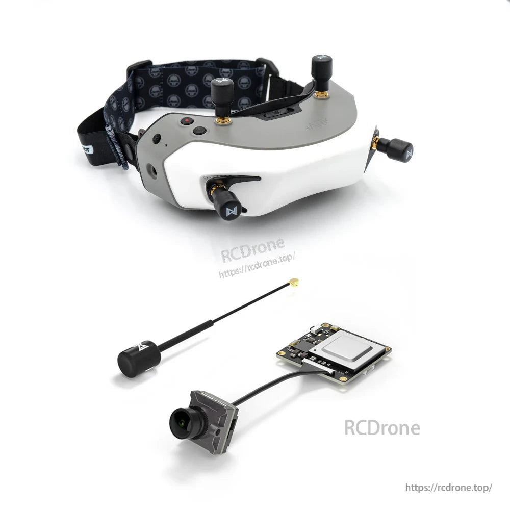 Accessory set close-up: whip antenna, FPV camera and transmitter board arranged on white background