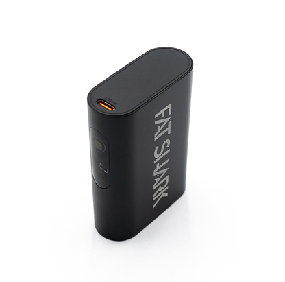 Fat Shark goggle battery angled side view showing USB-C OUT port on top and logo body