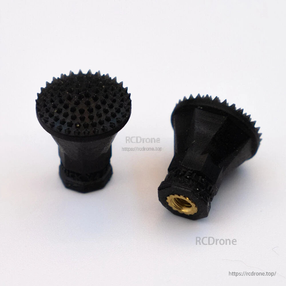 Flared-top spiked stick end grips in black, top and side views with threaded insert visible
