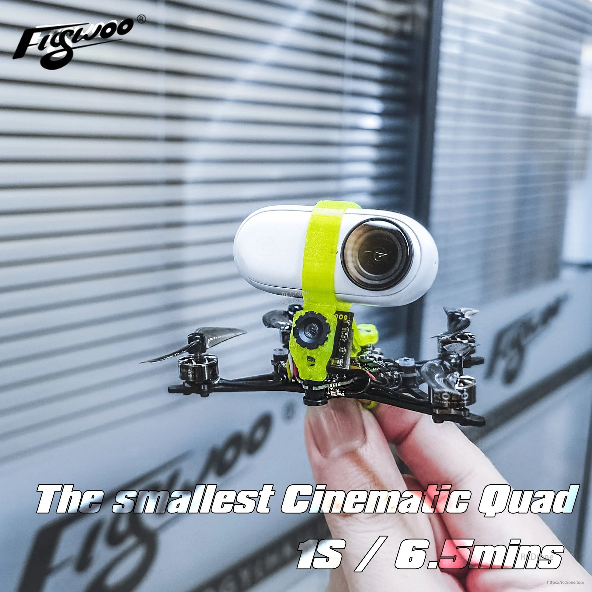 Firefly 1S Nano Baby Quad TPU Mount, Tiny 1S nano baby quad with white FPV camera secured by a bright yellow TPU mount and strap