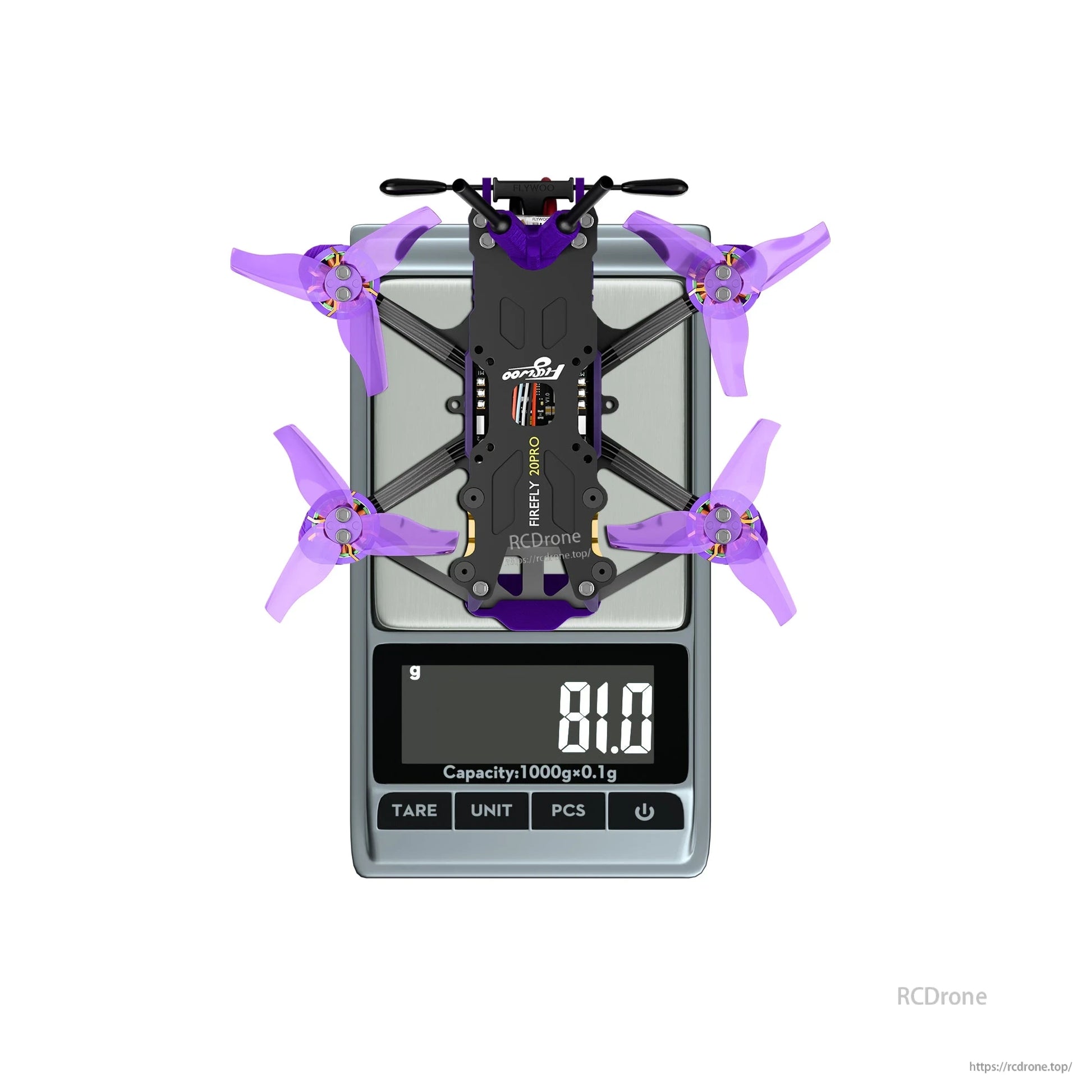 Firefly 20PRO micro FPV drone with purple tri-blade props on a digital scale reading 81.0 g