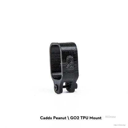 Firefly 2S Nano Baby 20 TPU Camera Mount, Black TPU camera mount bracket with strap-style cradle and two mounting holes, labeled Caddx Peanut/GO2