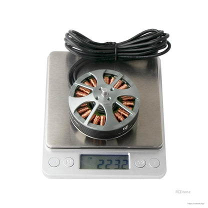 Flashhobby 5210 340KV Brushless Motor, Flashhobby 5210 340KV brushless outrunner motor with long leads, shown on digital scale reading 223.2 g