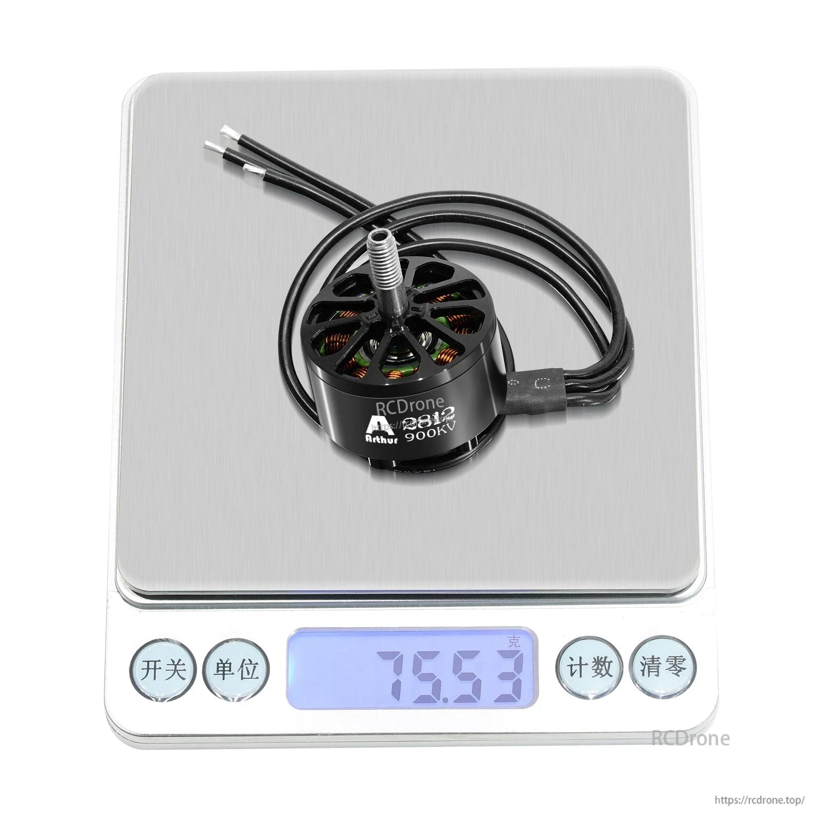 Flashhobby A2812 900KV brushless motor with three wires and threaded shaft on a digital scale reading 75.53