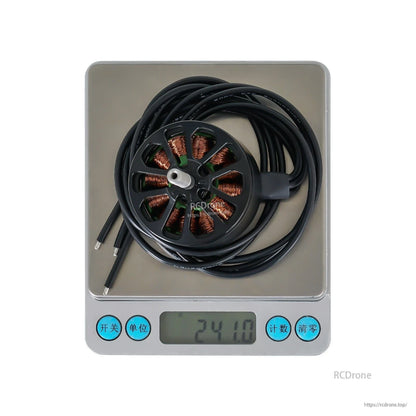 Flashhobby A4315 700KV Brushless Motor, Flashhobby A4315 brushless motor with long leads on a digital scale reading 241.0 g