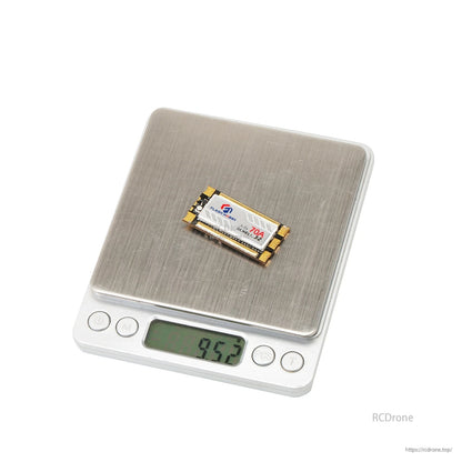 Flashhobby Arthur 70A 32Bit ESC, Flashhobby Arthur 70A 32-bit ESC module labeled BLHeli_32 sitting on a digital scale reading 9.52 g