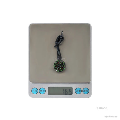 Flashhobby Arthur A1507 brushless motor with wires on a digital scale reading 16.5 g