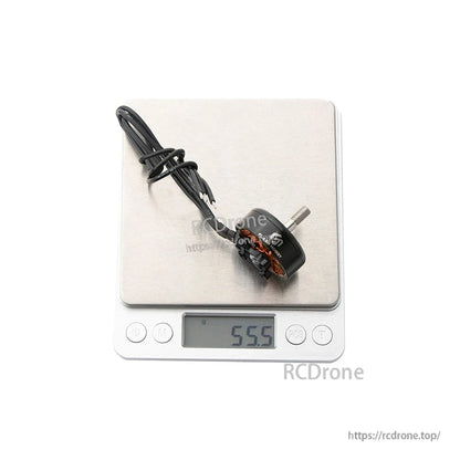 Flashhobby Arthur A2808 KV1100 brushless motor with attached wires on a digital scale reading 55.5 g