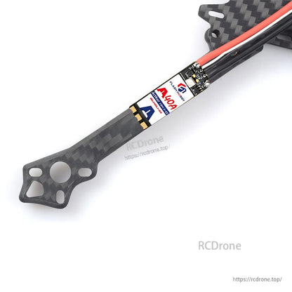 Flashhobby Arthur A40A slim 40A brushless ESC mounted on a carbon fiber arm with power and motor wires