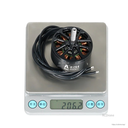 Flashhobby Arthur A4214 350KV brushless motor with attached wires on a digital scale reading 206.2 g
