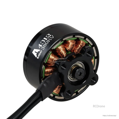 Flashhobby Arthur A4312 380KV brushless motor close-up with black housing, copper windings, and mounting hub