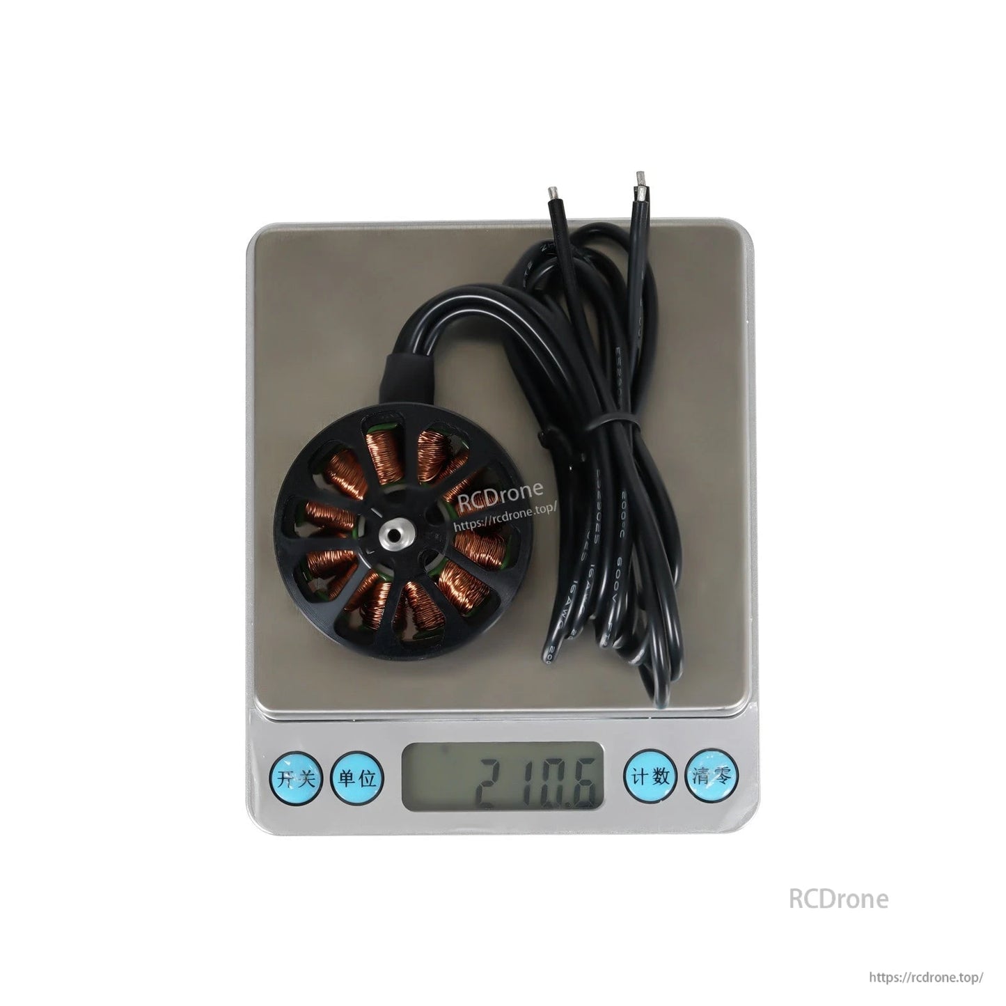 Flashhobby Arthur A4312 380KV Brushless Motor, Flashhobby Arthur A4312 brushless motor with long lead wires, sitting on a digital scale reading 210.6 g