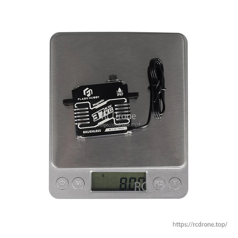 Flashhobby BLS3837MED Servo, Flashhobby BLS3837MED brushless servo on a digital scale, showing about 80 g weight with attached lead