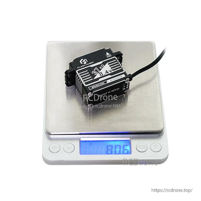 Flashhobby BLS4037RP brushless digital servo on a scale, labeled 37kg 8.4V and IP67, about 80.6g