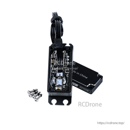 Flashhobby BLS4058RP servo with open case showing internal circuit board, cable lead, cover plate and screws