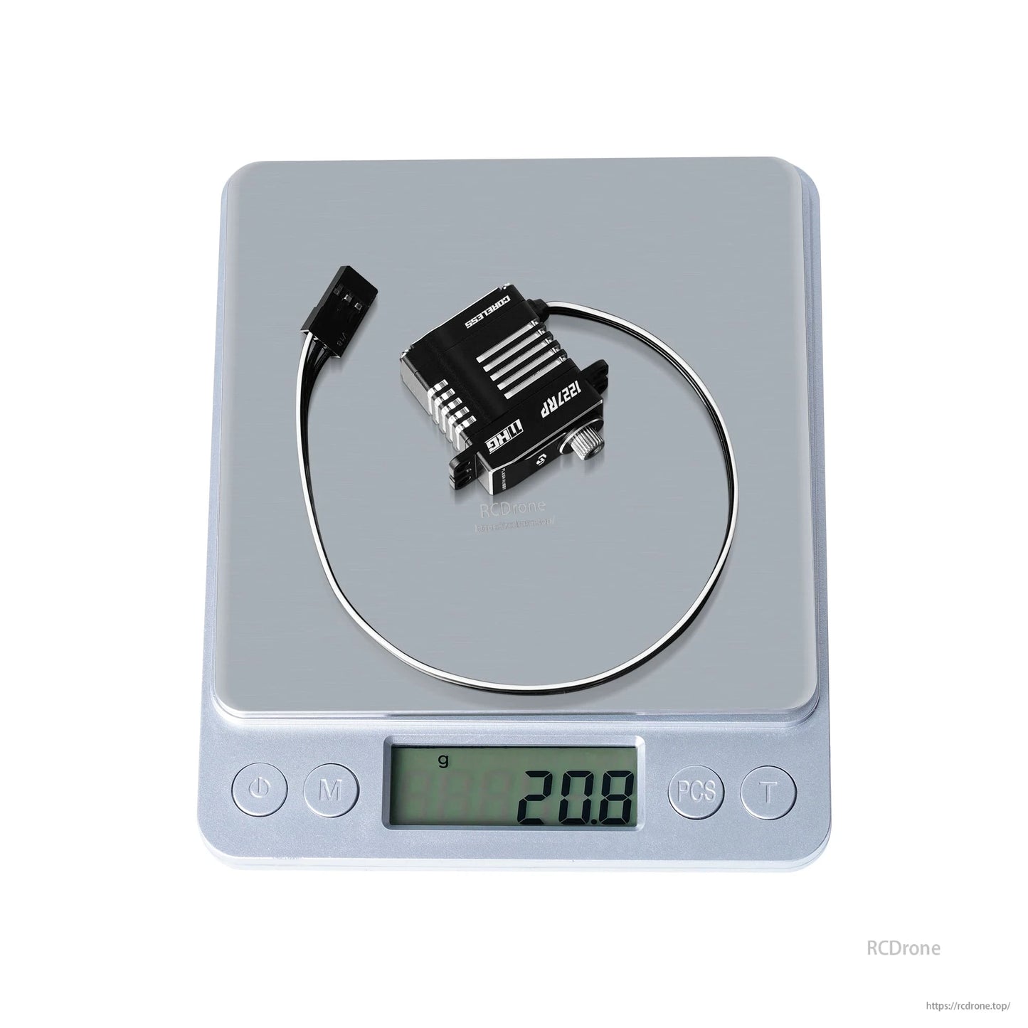 Flashhobby CLS1227RP micro digital servo with aluminum case and lead wire on a scale reading 20.8 g