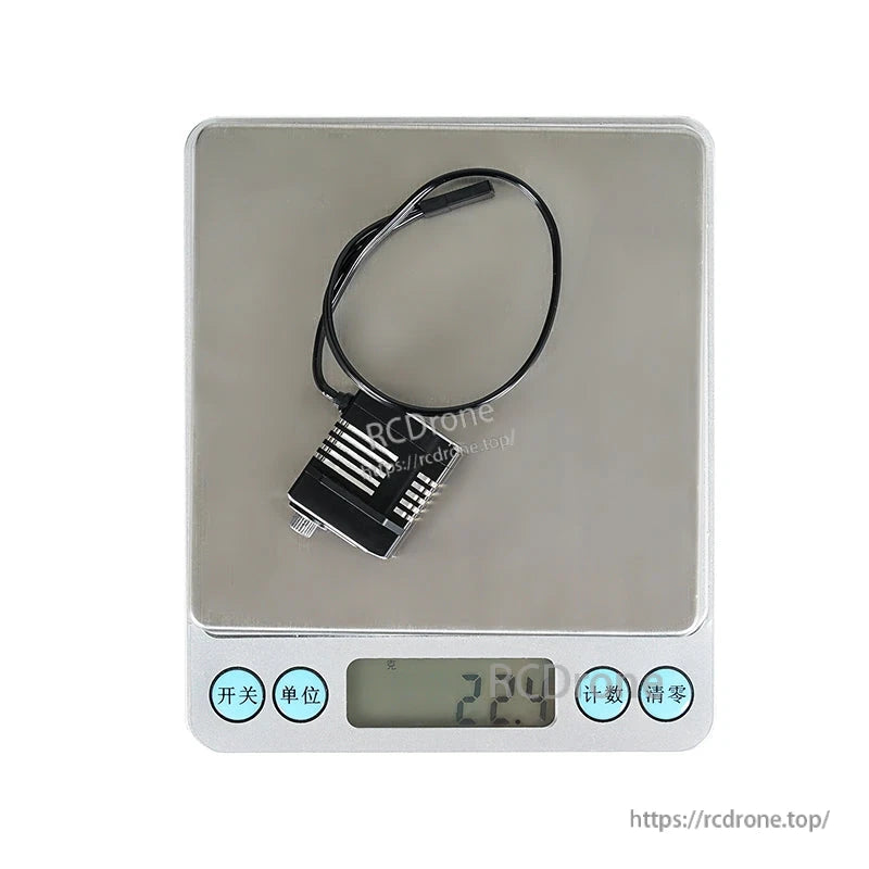 Flashhobby CLS1227RP V2 micro digital servo on a digital scale showing 22.0 g weight