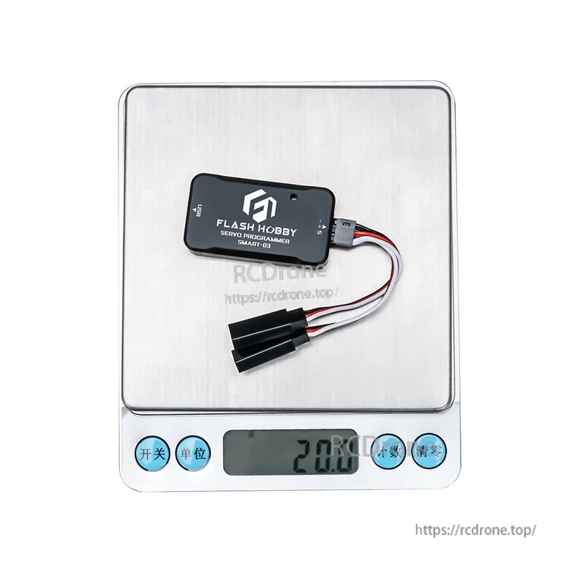 Flashhobby SMART-03 servo programmer module with USB port and 3-wire servo lead, shown on a scale at 20 g