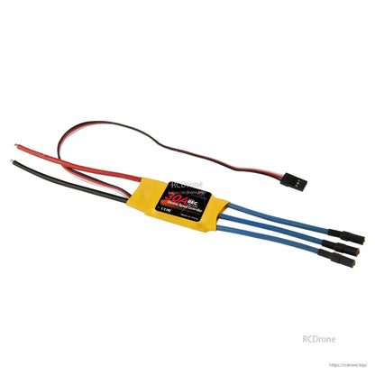 Flashhobby Spaceman 30A ESC with yellow shrink wrap, red/black battery leads, blue motor wires and servo plug