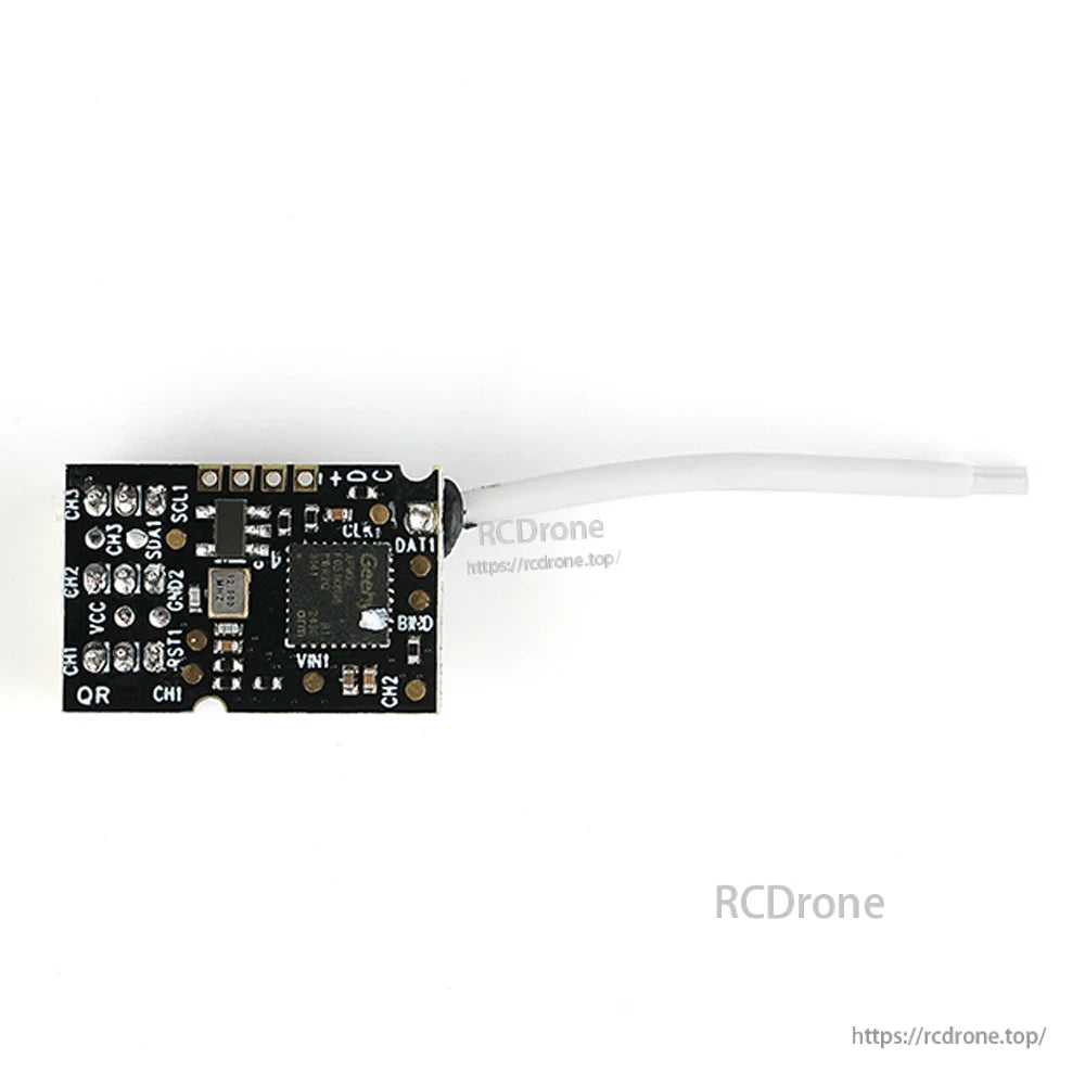 Back view in landscape orientation showing solder pad labels and antenna lead on right