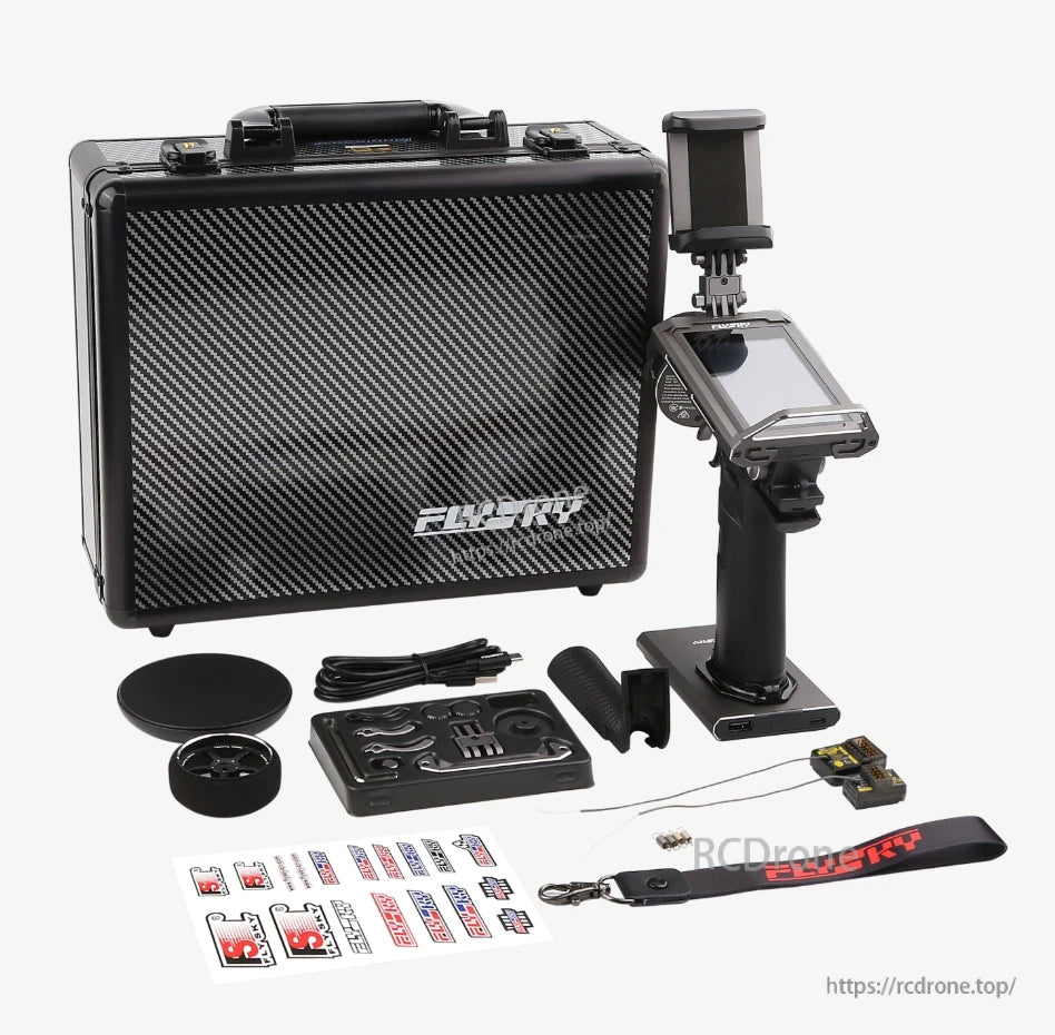 FlySky Noble NB4 Pro+ kit contents: transmitter, hard case, receiver, cables, strap, and accessories