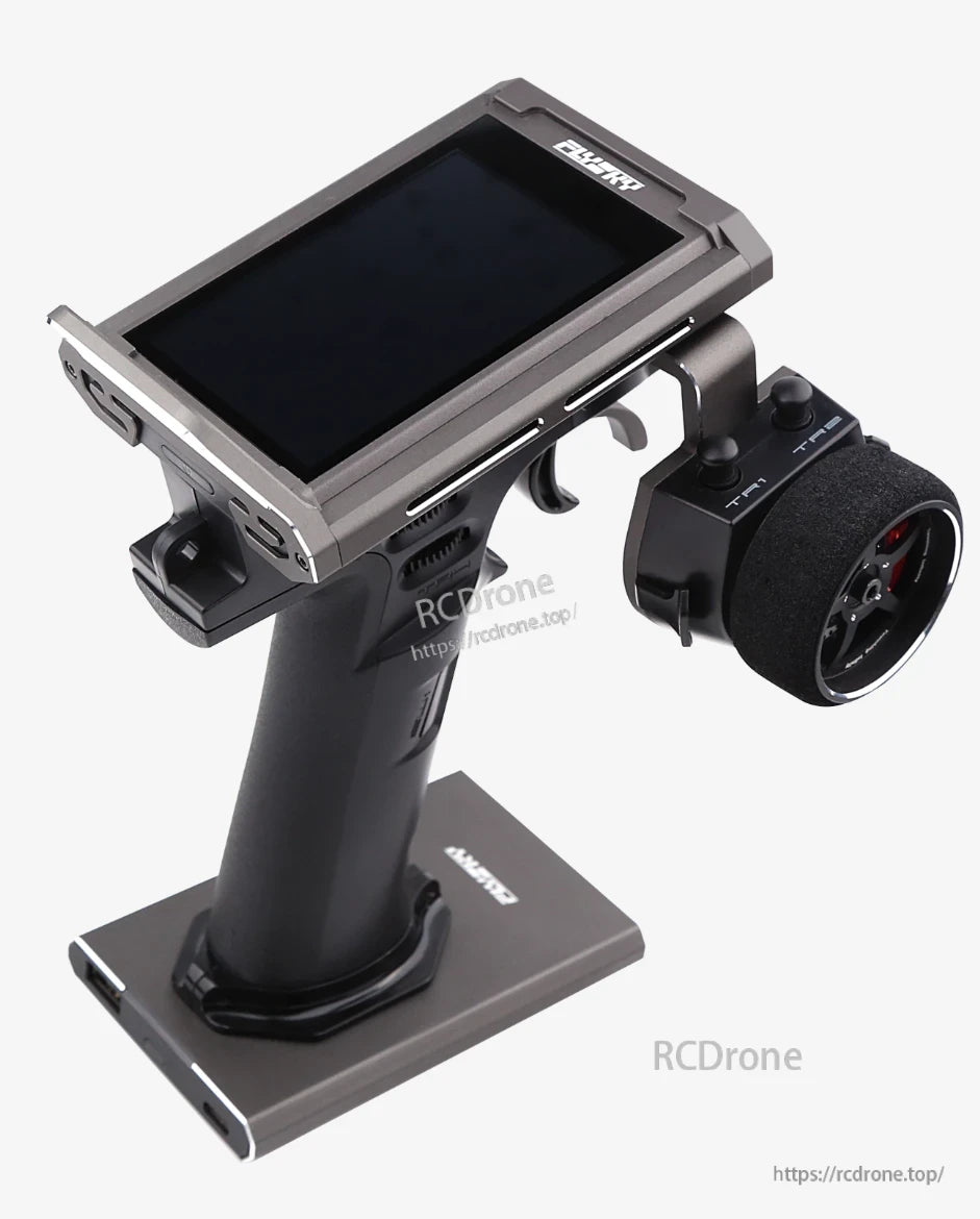 Noble NB4 Pro+ transmitter front-right view showing touchscreen, trigger, and foam steering wheel
